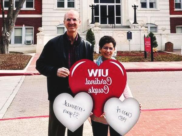 Red heart with UIW logo